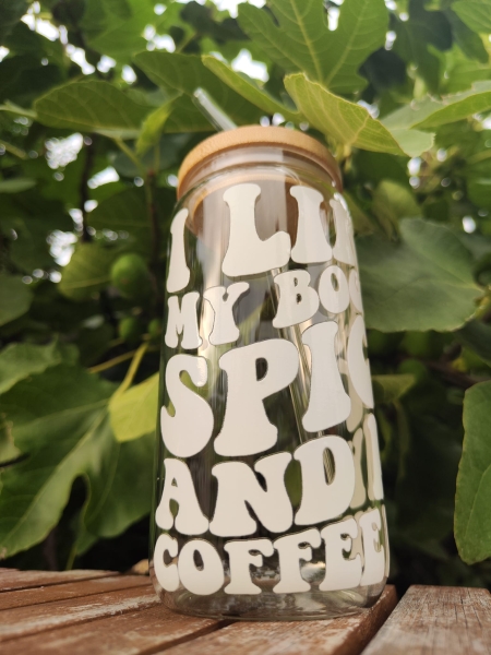 Trinkglas mit Deckel und Röhrchen "i like my books spicy and my coffee icy"